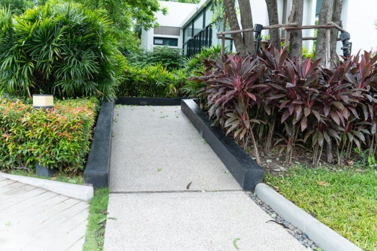 7 ADA Ramp Requirements Every California Property Owner Must Know 5 Gentle sloped pathway with edge protection and compliant gradient for wheelchair access