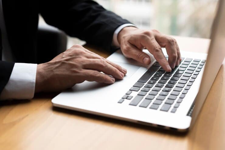 professional man typing laptop 23 2148377681 1