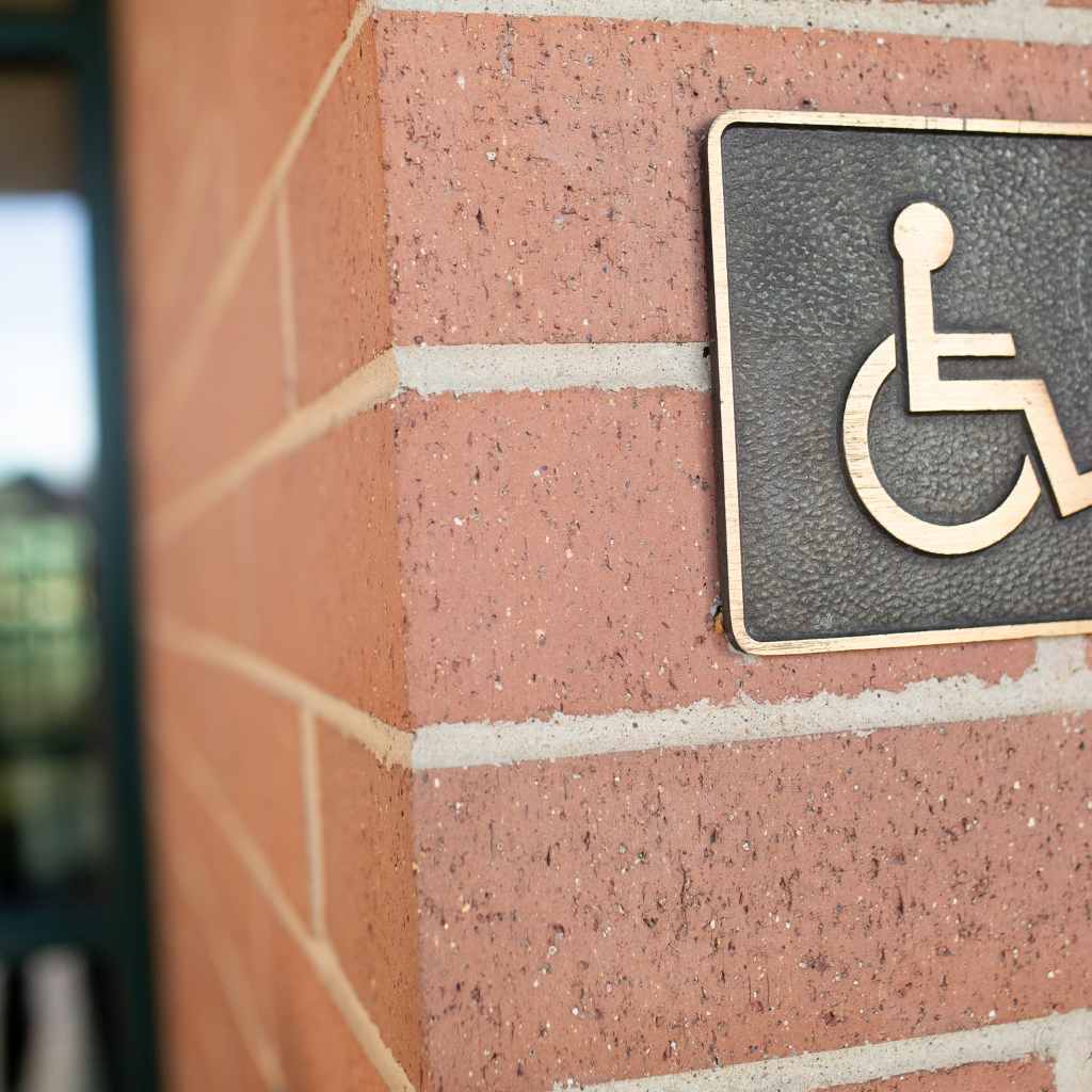 ADA Lawsuit in Fresno? Here’s How Local Businesses Can Bounce Back 2 ADA Accessibility Sign Outside Fresno Business Entrance