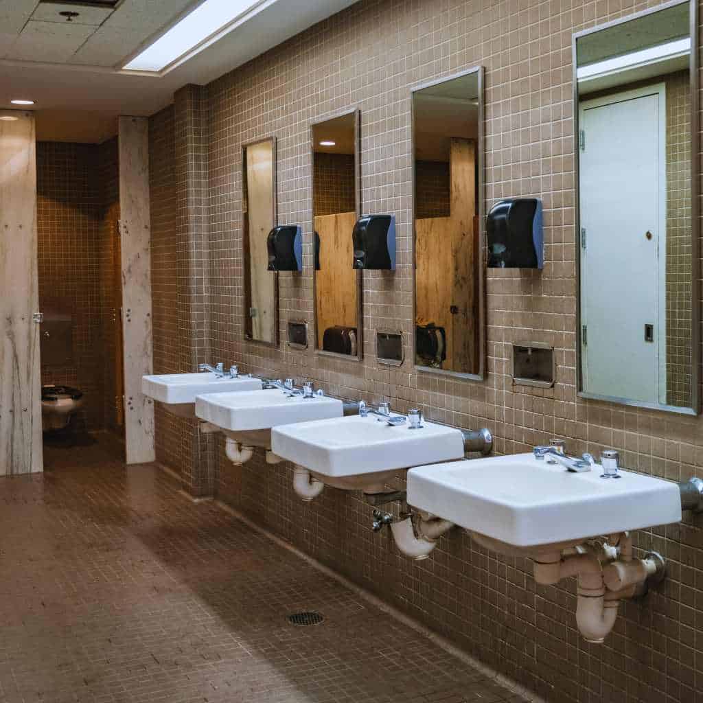 Make Your San Diego Restroom ADA Compliant | Step-by-Step Upgrade Guide 3 Wall Mounted Sinks with ADA Knee Clearance in Public Restroom