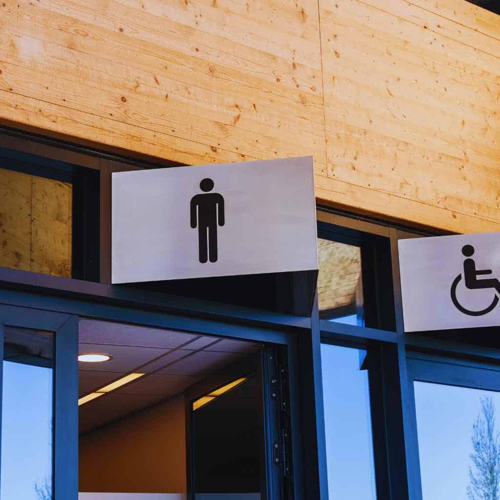 Restroom Entrances Showing Accessibility and Standard Signage