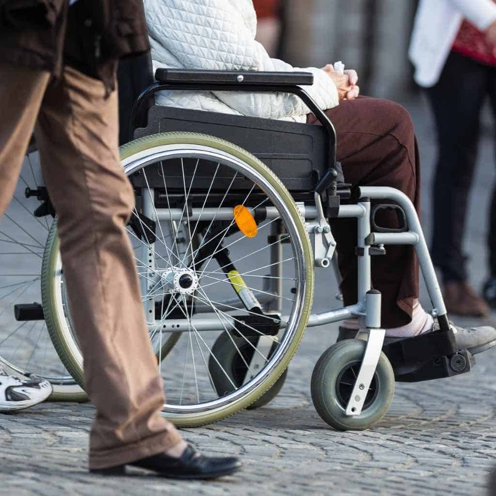 Sidewalk View of Wheelchair Navigation in Urban Area